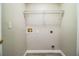 Laundry room with shelving and hookups for washer/dryer at 3926 Rollingsford Cir, Lakeland, FL 33810