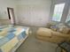 Primary bedroom with large closets and sitting area at 323 Travelers Dr, Polk City, FL 33868