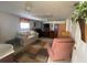 Finished basement with a sofa, recliner, and TV at 323 Travelers Dr, Polk City, FL 33868