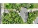 House and surrounding area shown from an aerial perspective at 8102 Lake Eve Dr, Orlando, FL 32810