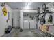 Convenient laundry room with washer and dryer, plus storage at 103 Coventry Ln, Haines City, FL 33844