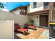 Relaxing patio with lounge chairs, perfect for outdoor enjoyment at 103 Coventry Ln, Haines City, FL 33844