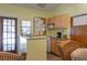 Small community kitchen with appliances and a counter at 103 Coventry Ln, Haines City, FL 33844