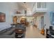 Open living area with high ceilings and loft view at 103 Coventry Ln, Haines City, FL 33844