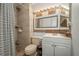 Simple bathroom with shower, toilet, and white vanity at 103 Coventry Ln, Haines City, FL 33844