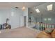 Spacious loft area overlooking the main living space, offering skylights and additional living space at 103 Coventry Ln, Haines City, FL 33844