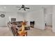 Comfortable living room with a leather sectional sofa and ceiling fan at 1955 Danes Ct, Lakeland, FL 33810