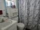 Bathroom with a shower/tub combo, toilet and updated vanity at 462 Cameo Dr # 462, Lakeland, FL 33803