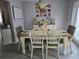 Farmhouse-style dining room with a rustic wooden table and seating for six at 462 Cameo Dr # 462, Lakeland, FL 33803