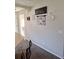 Hallway with wall decor and Gathering photos at 522 Raymond Ave, Frostproof, FL 33843