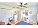 Spacious bedroom with double door closet and ceiling fan at 3258 Triple Crown Ln, Lakeland, FL 33811