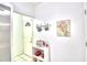 White entryway with a door and a small storage shelf at 3258 Triple Crown Ln, Lakeland, FL 33811