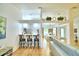 Kitchen with white cabinets, stainless steel appliances, and a breakfast bar at 3258 Triple Crown Ln, Lakeland, FL 33811