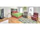 Main bedroom with a king-size bed and two recliners at 3258 Triple Crown Ln, Lakeland, FL 33811