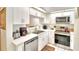 Bright kitchen features stainless steel appliances and ample cabinetry at 3258 Triple Crown Ln, Lakeland, FL 33811