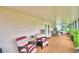 Covered patio with seating area and access to backyard at 3258 Triple Crown Ln, Lakeland, FL 33811