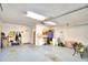 Garage with storage shelving and workbench at 3258 Triple Crown Ln, Lakeland, FL 33811