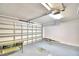 Spacious garage with storage and bench at 3258 Triple Crown Ln, Lakeland, FL 33811