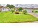 Cute house with well-manicured lawn and landscaping at 3258 Triple Crown Ln, Lakeland, FL 33811