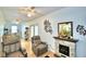 Relaxing living room with two recliners and a faux fireplace at 3258 Triple Crown Ln, Lakeland, FL 33811
