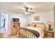 Comfortable bedroom with a queen-size bed and built-in shelving at 3258 Triple Crown Ln, Lakeland, FL 33811