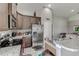 Updated kitchen with stainless steel appliances and granite countertops at 653 Hidden Lakes Ct, Haines City, FL 33844