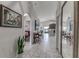 Bright entryway with tile floors and views into the living and dining areas at 653 Hidden Lakes Ct, Haines City, FL 33844