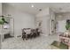 Dining room with table and chairs, adjacent to the kitchen at 653 Hidden Lakes Ct, Haines City, FL 33844