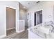 Elegant bathroom with marble vanity and walk-in shower at 5017 Ridgefield Lane, Lakeland, FL 33812