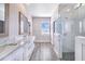 Spa-like bathroom with double vanity and large walk-in shower at 5017 Ridgefield Lane, Lakeland, FL 33812