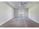 Main bedroom with carpet flooring and access to the backyard at 5017 Ridgefield Lane, Lakeland, FL 33812