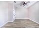 Spacious bedroom with hardwood floors and ceiling fan at 5017 Ridgefield Lane, Lakeland, FL 33812