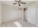 Light and airy bedroom with carpet and a large closet at 215 W Carter Rd, Lakeland, FL 33813