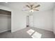 Bright bedroom with plush carpet and ample closet space at 4500 Old Colony Rd, Mulberry, FL 33860