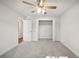 Spacious bedroom with double-door closet and neutral carpeting at 4500 Old Colony Rd, Mulberry, FL 33860