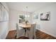 Bright dining area with wood table and four chairs at 4500 Old Colony Rd, Mulberry, FL 33860