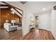 Bright and airy entryway with hardwood floors, leading to living room at 4500 Old Colony Rd, Mulberry, FL 33860