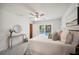 Main bedroom with pool view and ceiling fan at 4500 Old Colony Rd, Mulberry, FL 33860