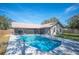 Inviting kidney-shaped pool with screened patio at 4500 Old Colony Rd, Mulberry, FL 33860