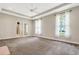 Spacious Gathering room with carpet flooring, ceiling fan and natural light at 6529 Longwood Trace S Ln, Lakeland, FL 33811
