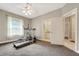 Carpeted room with elliptical and treadmill at 6529 Longwood Trace S Ln, Lakeland, FL 33811
