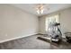 Bright room with carpet and exercise equipment at 6529 Longwood Trace S Ln, Lakeland, FL 33811