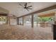Spacious outdoor kitchen with a built-in grill and stone countertop at 6529 Longwood Trace S Ln, Lakeland, FL 33811