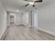 Spacious living area with hardwood floors and ceiling fan at 2529 Weber St, Lakeland, FL 33801