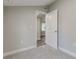 Spacious bedroom with grey walls and plush carpeting at 2529 Weber St, Lakeland, FL 33801