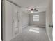 Bedroom with mirrored wardrobe and ceiling fan at 2529 Weber St, Lakeland, FL 33801
