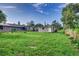 Spacious backyard with a small shed and grassy area at 2529 Weber St, Lakeland, FL 33801