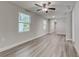 Bright living room with hardwood floors and neutral walls at 2529 Weber St, Lakeland, FL 33801