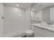 Clean bathroom with white subway tile and marble vanity at 2529 Weber St, Lakeland, FL 33801