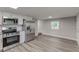 Modern kitchen featuring stainless steel appliances and white shaker cabinets at 2529 Weber St, Lakeland, FL 33801